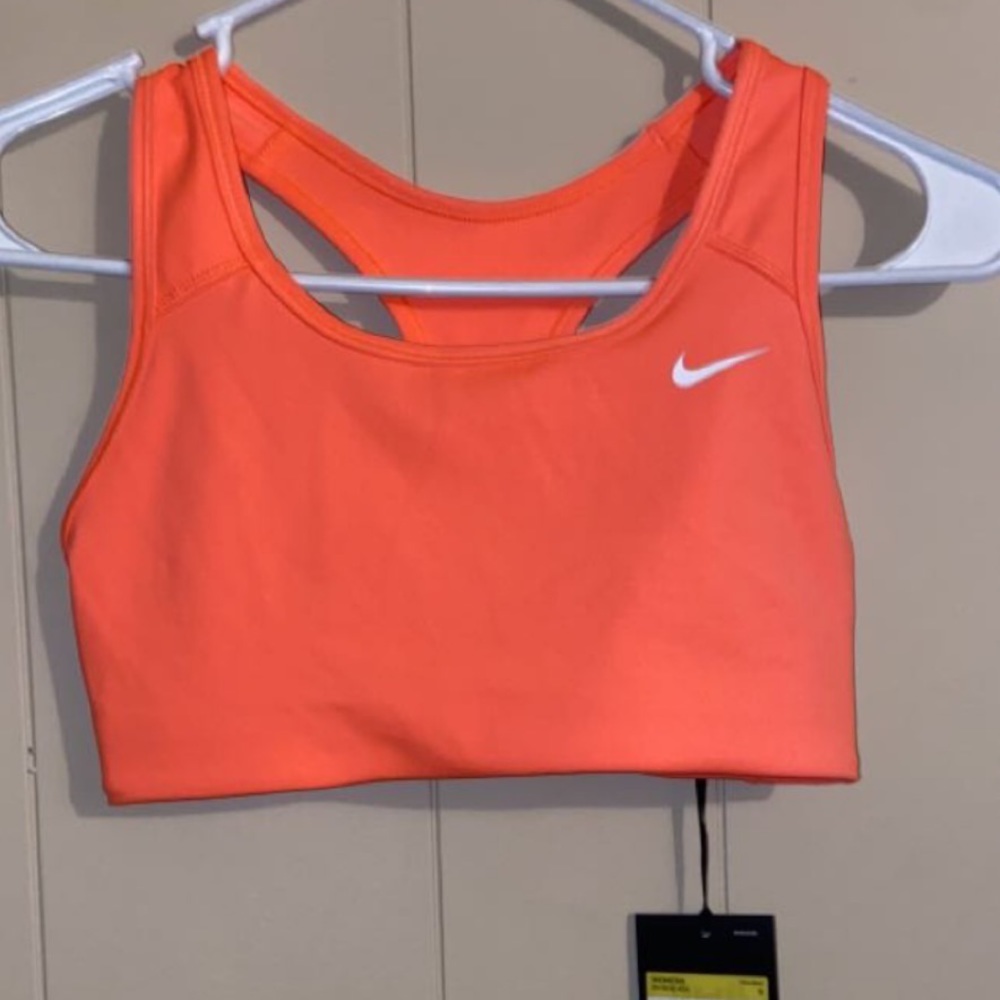 Women’s Nike sports bra coral orange color women’s Small